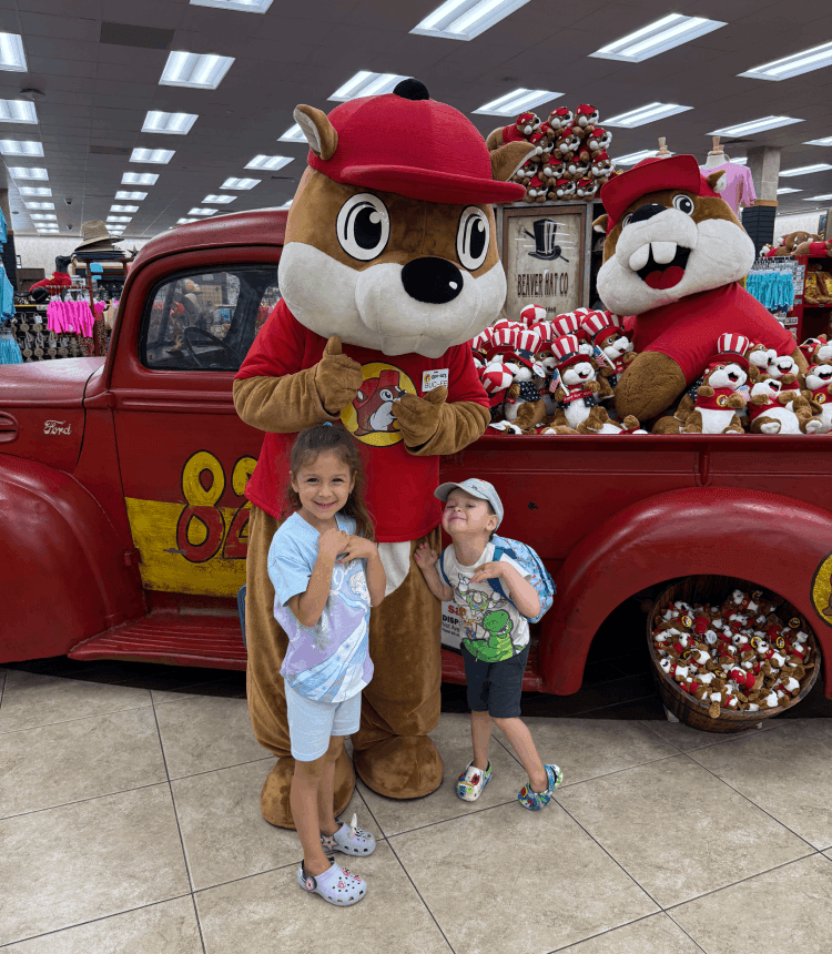 The kids stretching their legs during a 30-minute EV charging stop at Buc-ee's